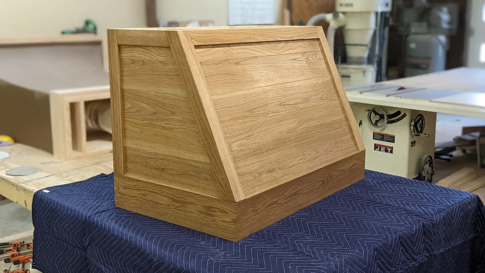 White oak Cottage range hood on the workshop table
